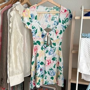 Open back, mini floral dress with cut out in front and bow, flowy skirt, from UO